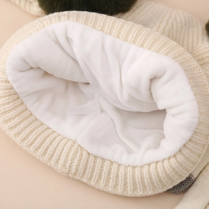 Winter fleece lined knit hat for children with warm white faux fur lining and green pompom