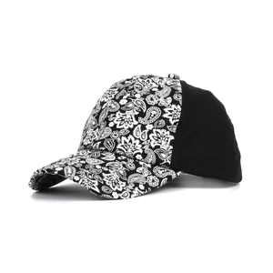 Women's paisley print baseball cap featuring a black and white criss-cross ponytail design