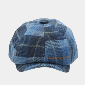 Classic blue plaid newsboy cap in wool blend featuring a vintage British style pattern