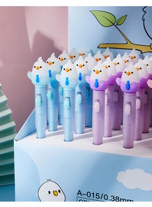 Macro shot of 0.38mm bird-themed gel pens in blue and purple pastel finishes