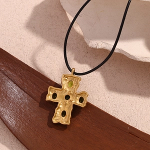 Vintage 18K gold-plated hammered cross necklace with green gems and black cord
