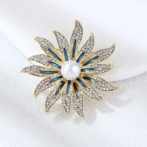 Golden sunflower brooch with white diamonds, blue enamel and a large center pearl