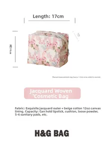 Pink bow floral makeup bag measuring 17x11x14cm with jacquard fabric and canvas lining
