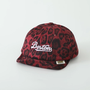 Detailed view of baby baseball cap with red leopard print and Boston script embroidery
