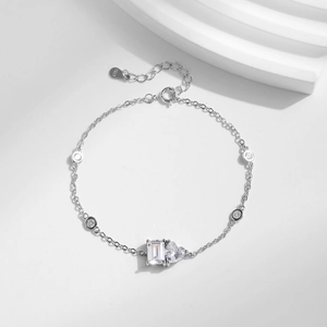 Elegant S925 sterling silver bracelet featuring square and heart-shaped sparkling gems