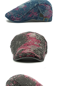 Detail of washed denim beret with pink embroidery and adjustable bronze side buckle