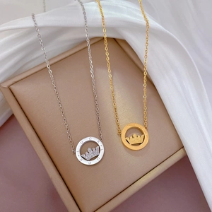 Titanium steel crown pendant necklace with LUCK engraving in gold and silver finishes