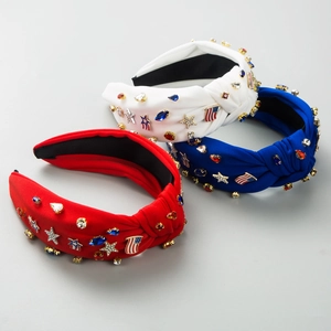Close-up of three knotted headbands with rhinestones and USA flag star charms in red, white and blue