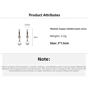 Detail view of pearl tassel earrings showing 3cm length and 1.5cm width dimensions