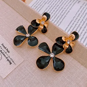 French vintage double-layered black enamel flower earrings with crystal stud detail