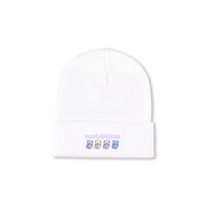 Close-up of white knit beanie with four cartoon bears and Japanese text embroidery
