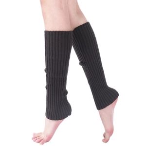 Side view of dark brown knitted leg warmers with ribbed texture on model leg