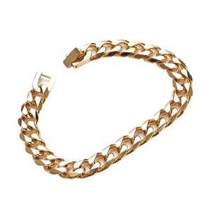 Men's vintage golden stainless steel Cuban link bracelet on a clean white background