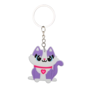 Detailed view of a cute white cartoon cat keychain with purple and pink PVC soft rubber