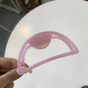 Pink semi-circular handmade resin hair claw with France Handmade engraving detail