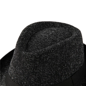 Classic men's vintage fedora hat in dark grey woven texture with elegant crown detail