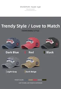 Detail view of vintage washed cotton baseball caps with distressed edges and 3D embroidery