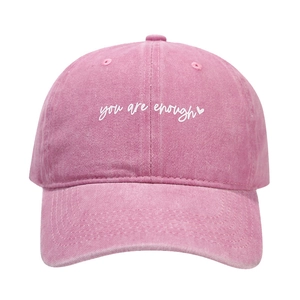 Pink washed cotton baseball cap with you are enough heart embroidery and curved brim