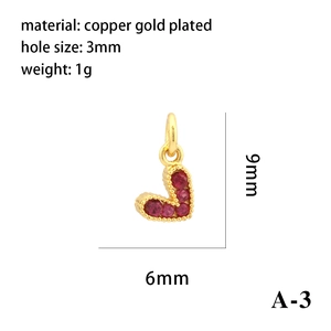Detail showing 9mm x 6mm 18K gold plated copper heart pendant with red zircon inlay