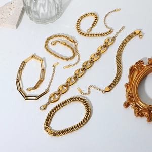 Gold 18K stainless steel bracelet set featuring Cuban, snake, and rope chain styles