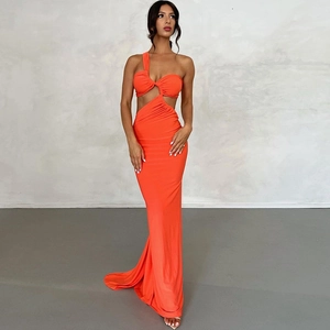 Detail of orange one-shoulder evening dress with side waist cut-out and knot detail
