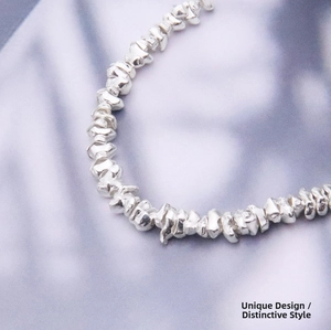 Macro shot of S925 sterling silver irregular nugget spacer beads for DIY jewelry making