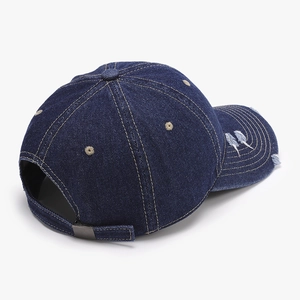 Vintage navy washed denim baseball cap with distressed brim and contrast stitching