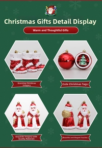 Detailed view of red Christmas boot ornaments and Santa Claus figurine set