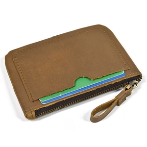 Detail view of brown crazy horse leather coin purse with zipper and multi-card slots