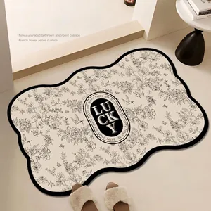 French retro quick-dry bath mat with wavy edges and floral pattern on cream base