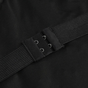 Detail of high-elastic black webbing with double metal hook closures on a party dress