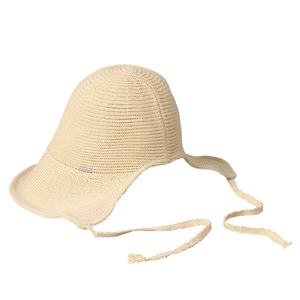Breathable beige knitted sun hat with ties and metal plaque in a minimalist style