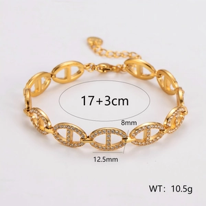 Gold stainless steel pig nose link bracelet with rhinestones and size specifications