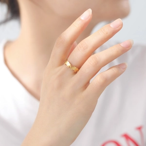 Golden elephant motif open ring in polished stainless steel with hollow cutout design