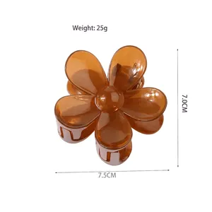 Translucent brown flower hair claw clip made of acrylic resin for elegant hair styling
