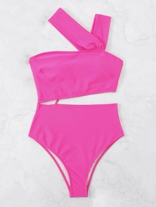 Detailed view of neon pink one-shoulder cutout monokini with high waist cut and sleek fabric