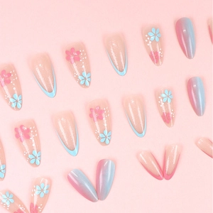 Blue and pink floral press-on nails with glitter finish in almond shape set