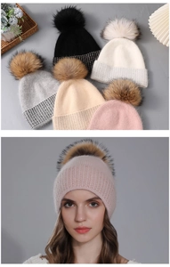 Detail showing various colors of knitted beanies with fluffy raccoon fur pom poms