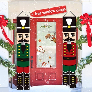 Nutcracker Christmas door curtains on a festive red door with free window clings