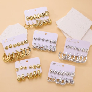 Chic gold and silver C-shaped earring set with assorted stud and hoop styles
