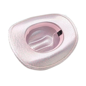 Detail view of pink sequin cowboy hat interior with logo tag and 100% polyester fabric