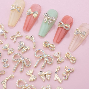 Exquisite 3D bow nail art charms set with crystals and pearls on gold alloy base