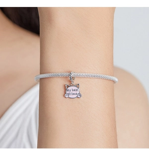 Close-up of S925 silver snake chain bracelet featuring a pink cat charm with My Best Friend
