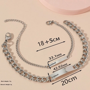 Detail view of steel couple bracelets showing precise dimensions and polished metal plate