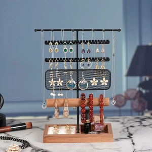Black metal jewelry organizer with wooden base for necklaces, earrings and rings