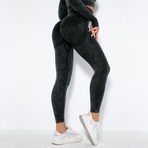 Detailed back view of seamless scrunch butt yoga leggings and long sleeve crop top in grey