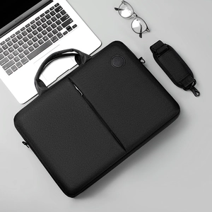 Business laptop bag in black fabric with detachable shoulder strap and sleek design
