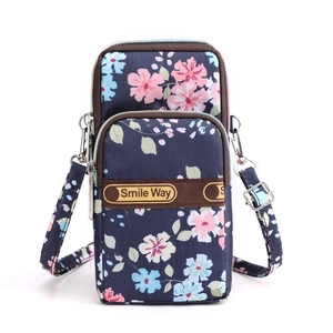 Floral nylon crossbody phone bag in navy blue with two zippers and adjustable strap