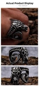 Macro shot of ram skull detail and horns on vintage stainless steel gothic biker ring