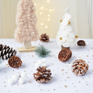 Pink wool and white felt miniature Christmas tree decor set on wooden base
